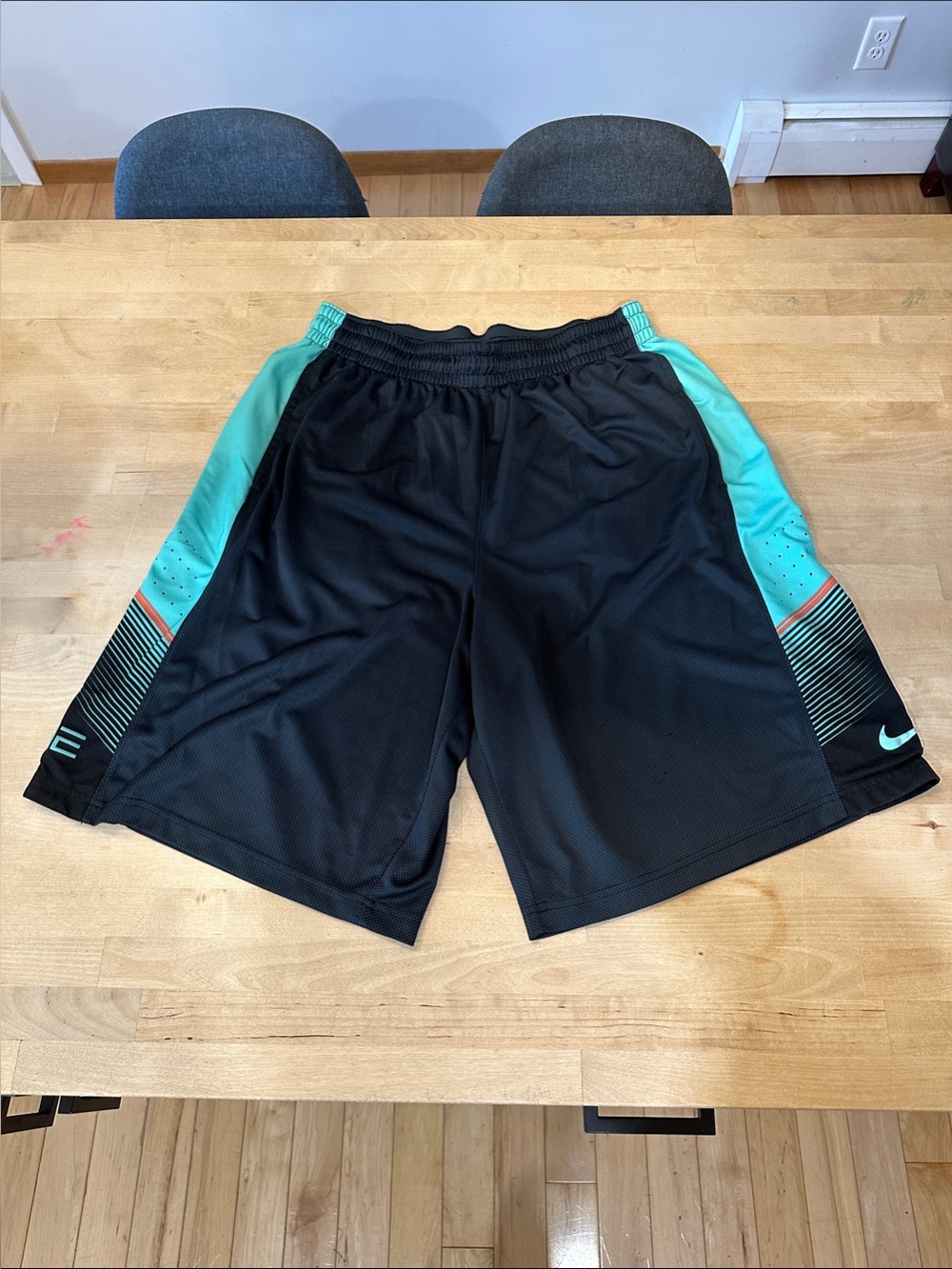 Nike Men’s Black Athletic Shorts with Teal Side Panels and Mint Accents